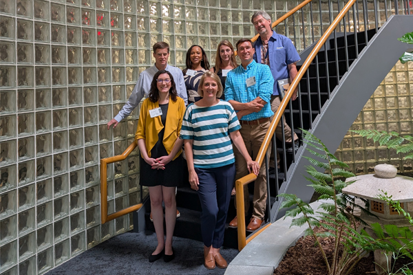 group photo on a spiral staircase